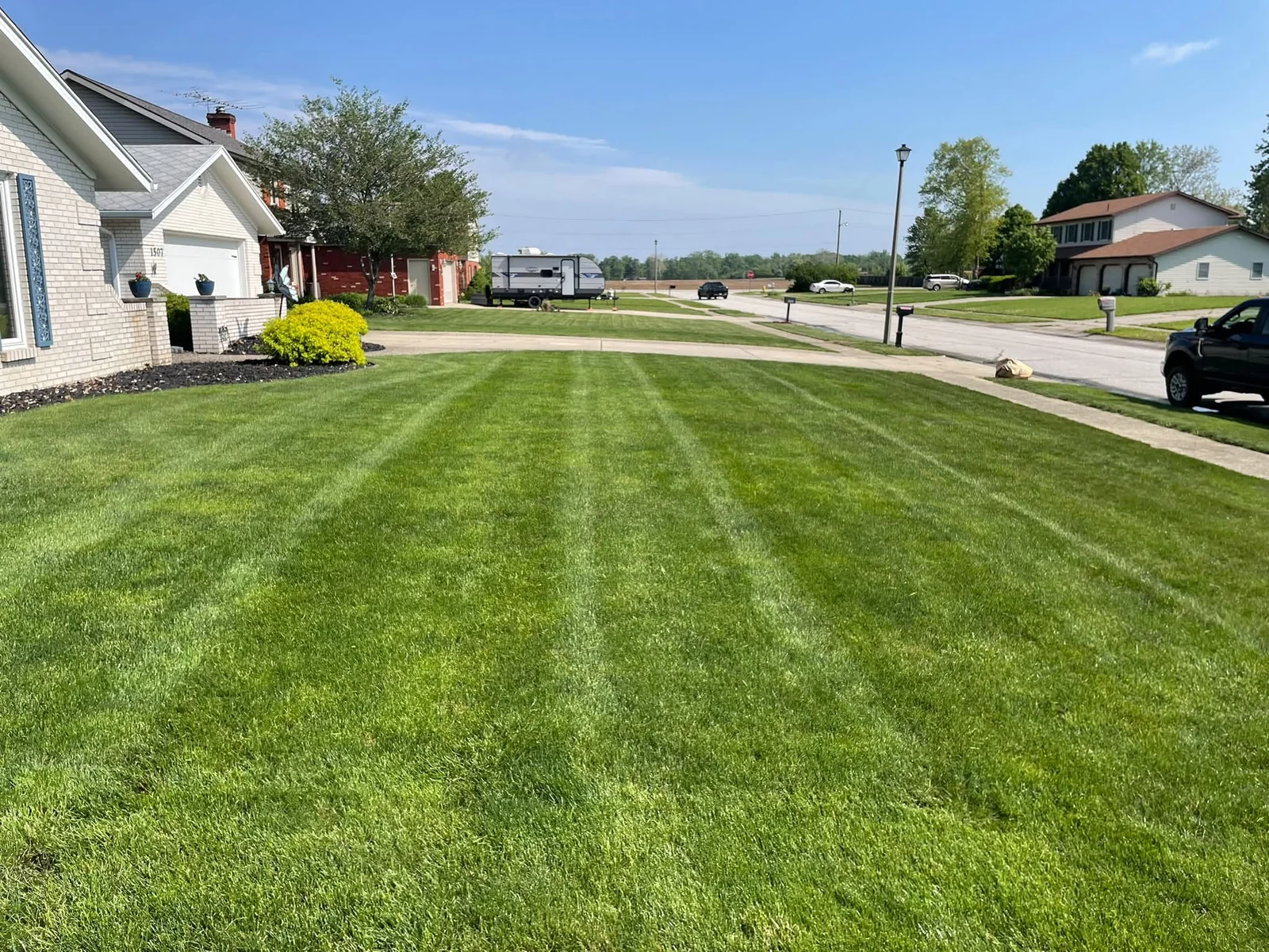 Freshly cut lawn with neat mowing stripes from Nevan’s project photos